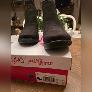 Rykä Noelle Next water-repellent ankle bootie in black, size 9.5M. 